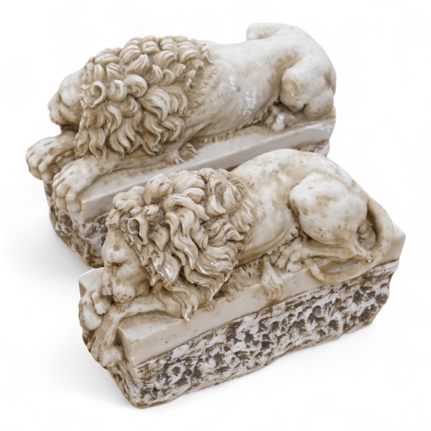 A pair of marble resin Canova lions, 30cm wide